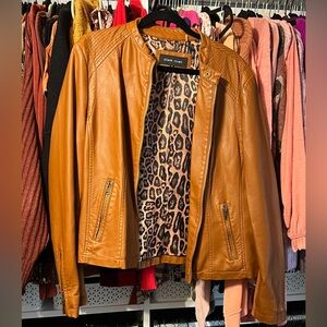 Camel color leather jacket. Size XL. Leopard interior. Gently loved.